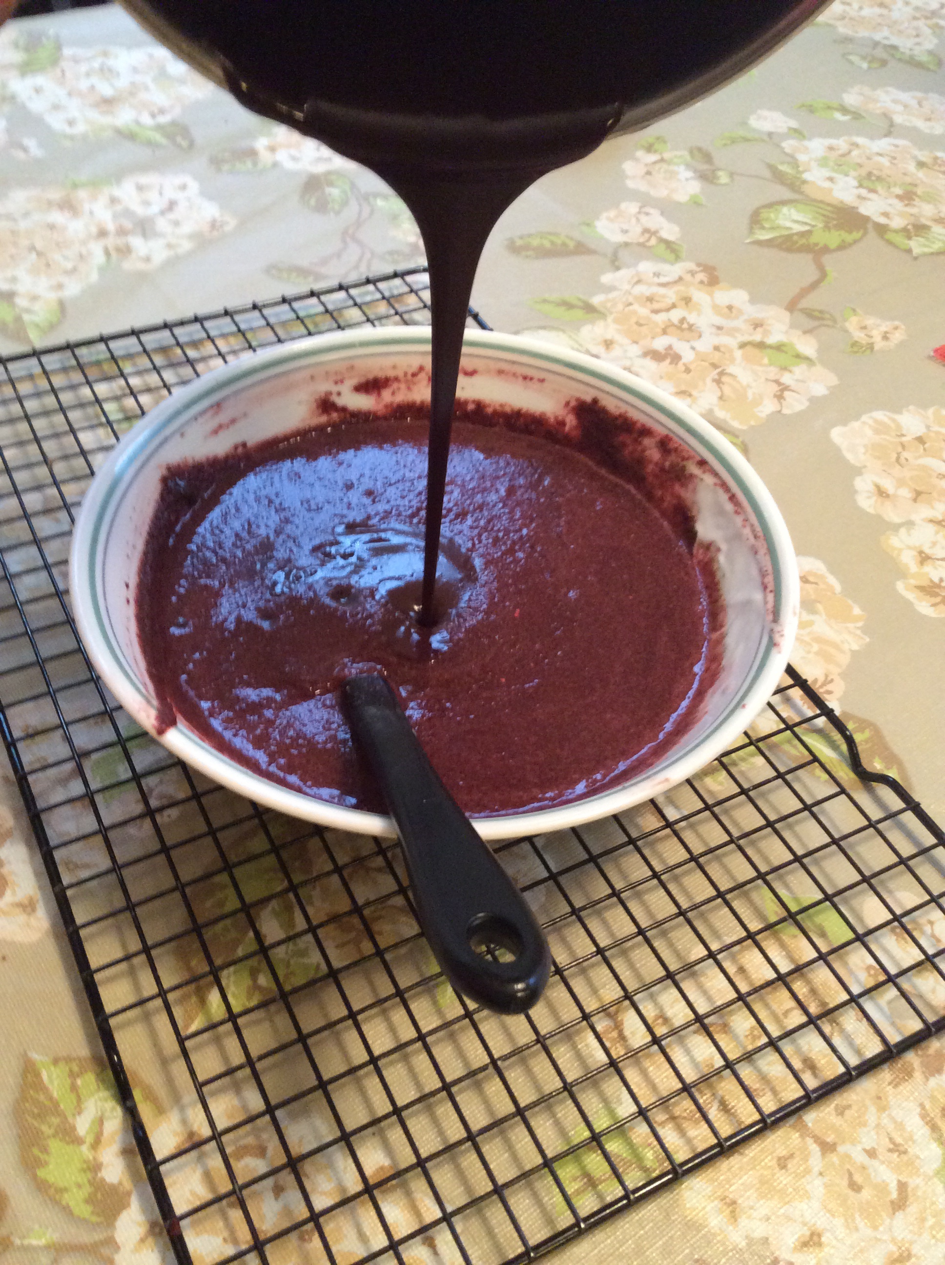 Adding melted butter-chocolate mixture to the Veggie Purée 