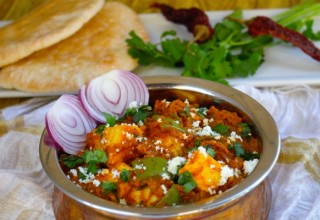 Kadhai Paneer- Cottage Cheese Sauteed in Tomato base with aromatic Indian spices