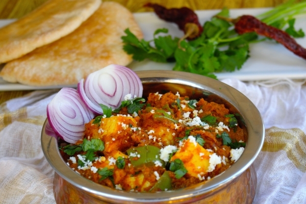 Kadhai Paneer- Cottage Cheese Sauteed in Tomato base with aromatic Indian spices
